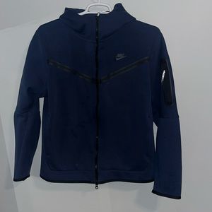 Large Navy blue Nike tech.